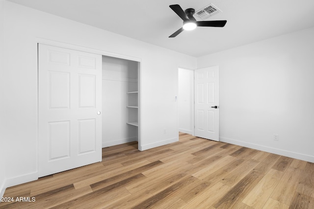 unfurnished bedroom featuring a closet, ceiling fan, and light hardwood / wood-style floors