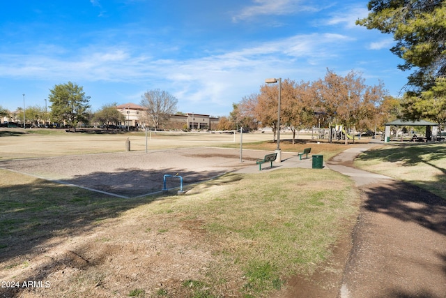 view of home's community featuring a gazebo, volleyball court, and a lawn