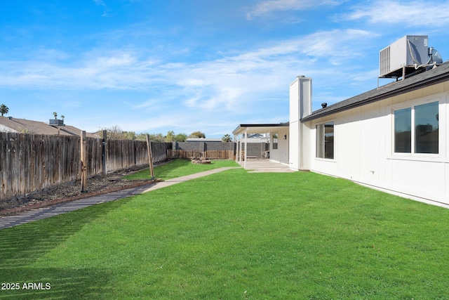 view of yard featuring a patio and cooling unit