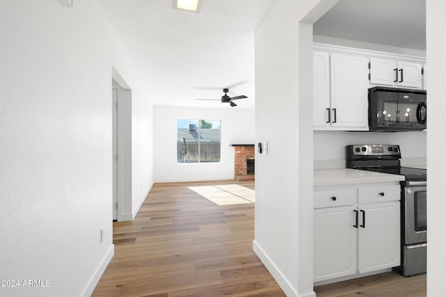 hallway featuring light hardwood / wood-style flooring