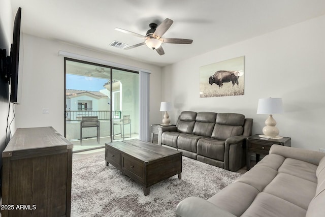 living room with ceiling fan