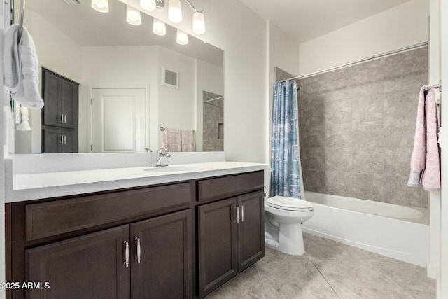 full bathroom featuring toilet, vanity, tile patterned flooring, and shower / bathtub combination with curtain