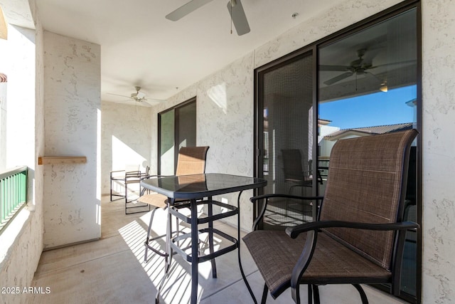 balcony featuring ceiling fan