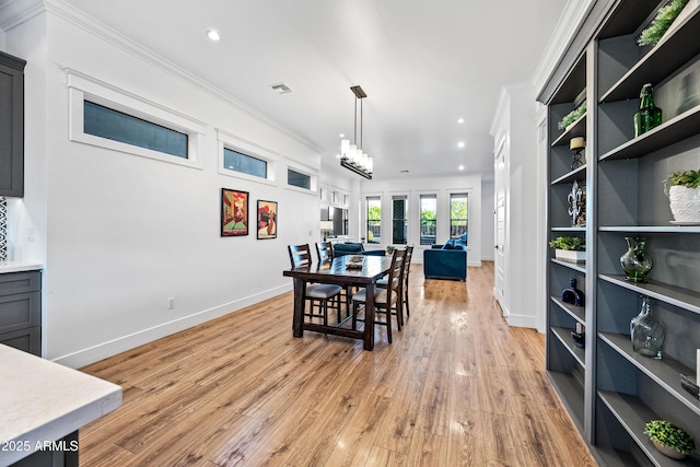 306 W Culver St, Phoenix, AZ 85003 - dining space with crown molding, recessed lighting, baseboards, and light wood finished floors