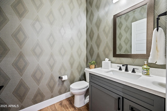 306 W Culver St, Phoenix, AZ 85003 - half bath featuring wood finished floors, toilet, and vanity