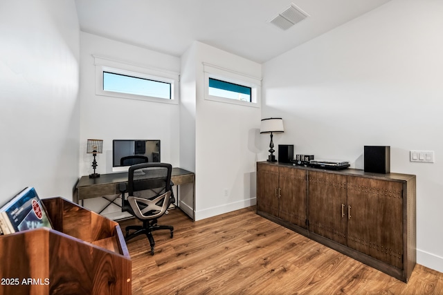 306 W Culver St, Phoenix, AZ 85003 - office space featuring light wood-style floors, baseboards, and healthy amount of natural light