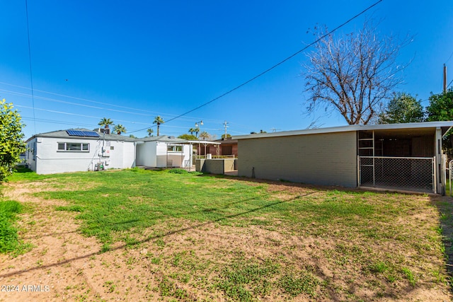 view of yard featuring a carport