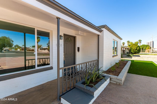 property entrance with a porch