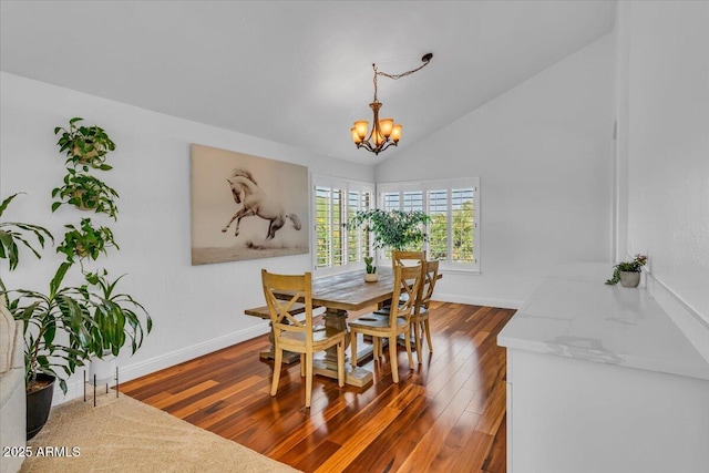 4402 E Barwick Dr, Cave Creek, AZ 85331 - dining space with a chandelier, dark wood-type flooring, and vaulted ceiling