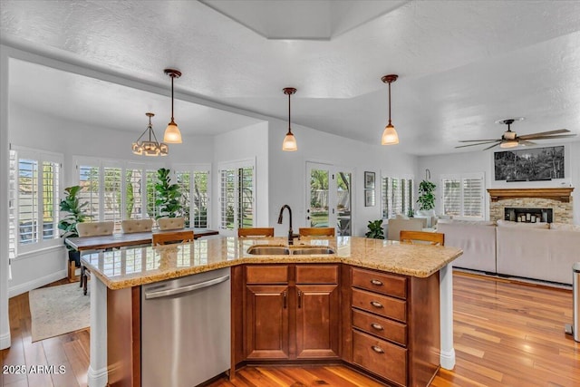4402 E Barwick Dr, Cave Creek, AZ 85331 - kitchen featuring dishwasher, light wood-style floors, light stone counters, and a ceiling fan