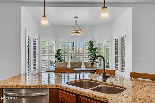 4402 E Barwick Dr, Cave Creek, AZ 85331 - kitchen featuring stainless steel dishwasher, decorative light fixtures, light stone counters, and a chandelier