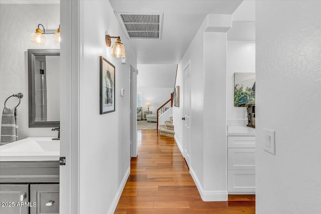 4402 E Barwick Dr, Cave Creek, AZ 85331 - hallway featuring wood finished floors and stairway