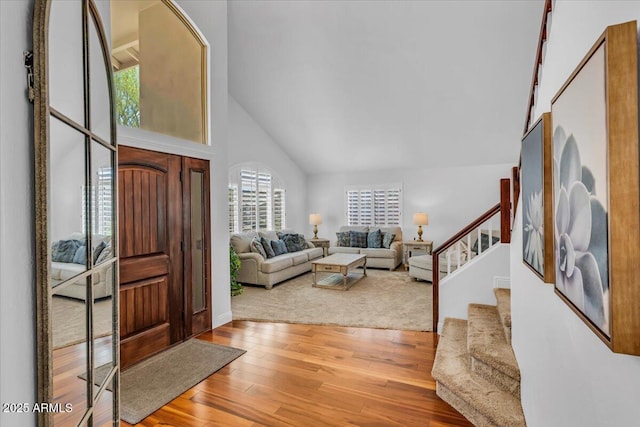 4402 E Barwick Dr, Cave Creek, AZ 85331 - foyer featuring wood finished floors, stairway, and high vaulted ceiling