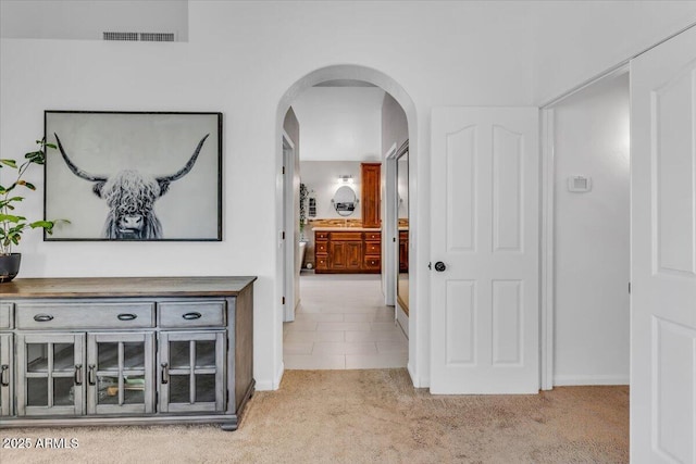 4402 E Barwick Dr, Cave Creek, AZ 85331 - hall with arched walkways and light colored carpet