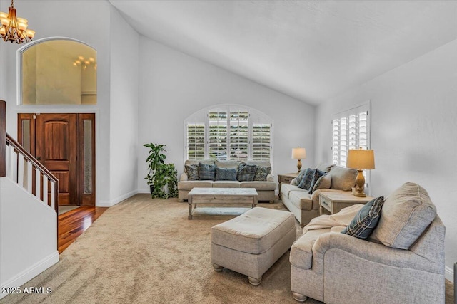 4402 E Barwick Dr, Cave Creek, AZ 85331 - living room with a chandelier, carpet, and high vaulted ceiling