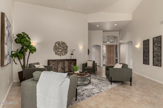 living room featuring lofted ceiling