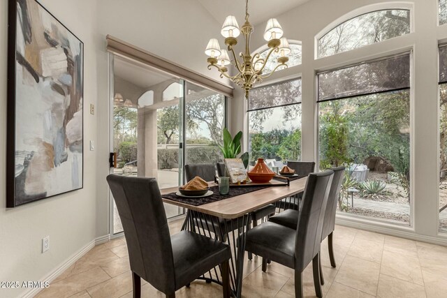 sunroom with an inviting chandelier, a wealth of natural light, and lofted ceiling