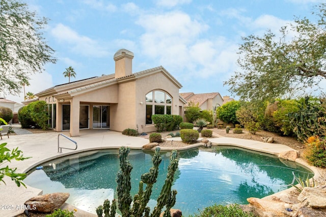 back of house featuring a patio area