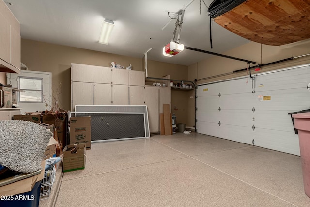 garage featuring a garage door opener