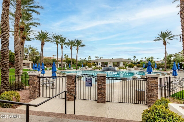 view of swimming pool with a patio