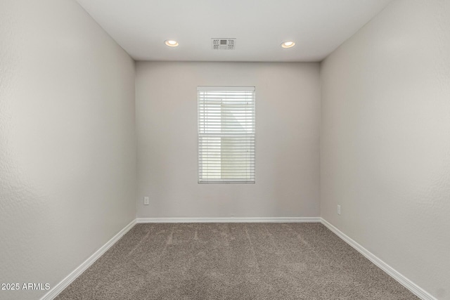 2000 N 36th St Unit 29, Phoenix, AZ 85008 - empty room featuring carpet flooring, baseboards, and recessed lighting