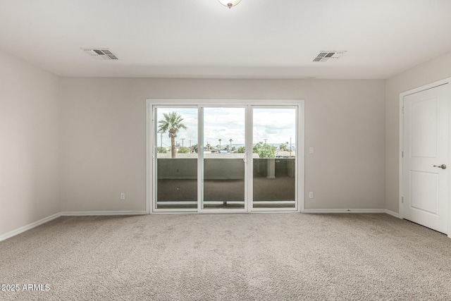 2000 N 36th St Unit 29, Phoenix, AZ 85008 - spare room featuring carpet floors and baseboards