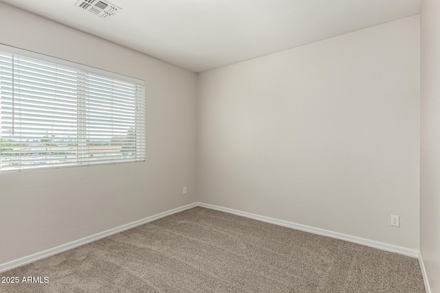 2000 N 36th St Unit 29, Phoenix, AZ 85008 - unfurnished room with carpet floors and baseboards