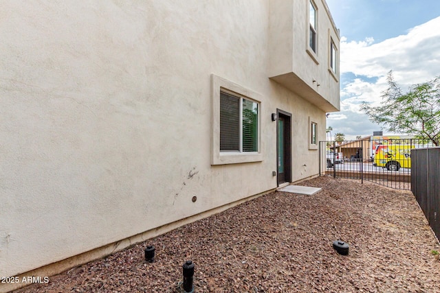 2000 N 36th St Unit 29, Phoenix, AZ 85008 - view of side of home featuring fence and stucco siding