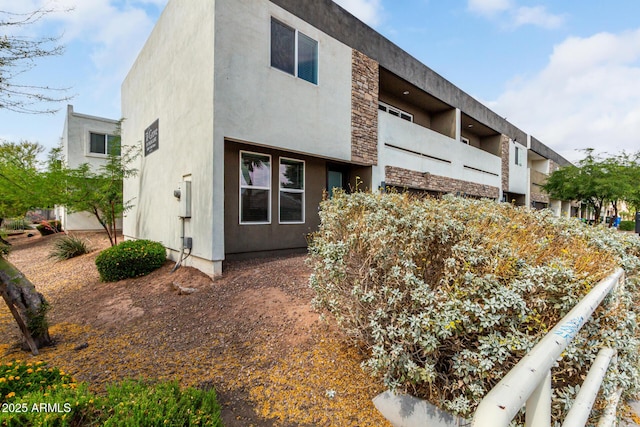 2000 N 36th St Unit 29, Phoenix, AZ 85008 - rear view of property with stucco siding