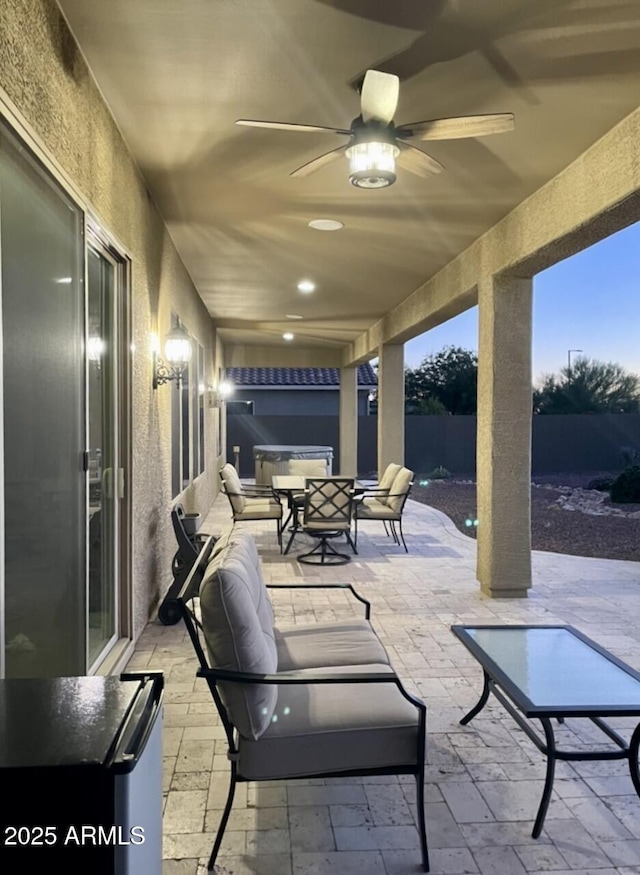 43916 N 50th Ln, New River, AZ 85087 - fenced backyard featuring a patio, outdoor dining area, and ceiling fan