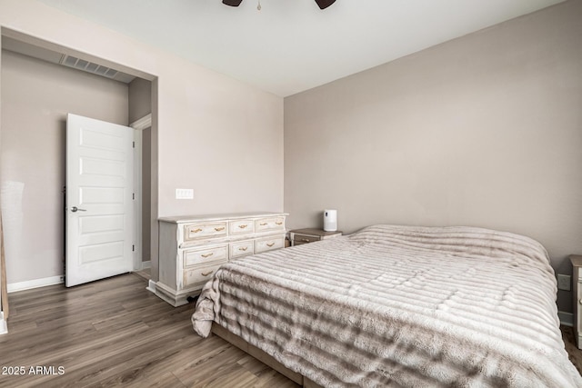 19920 W Monterosa St, Litchfield Park, AZ 85340 - bedroom featuring a ceiling fan, dark wood-style flooring, and baseboards