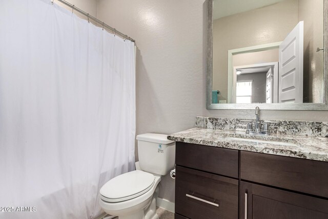 19920 W Monterosa St, Litchfield Park, AZ 85340 - bathroom featuring shower / bath combination with curtain, vanity, and toilet