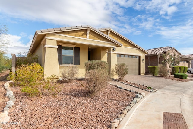 19920 W Monterosa St, Litchfield Park, AZ 85340 - view of front of house with driveway, an attached garage, and stucco siding
