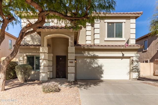 44344 W Knauss Dr, Maricopa, AZ 85138 - mediterranean / spanish home featuring a garage