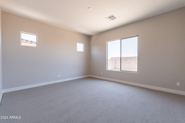 empty room with carpet flooring