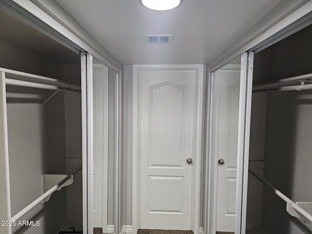 spacious closet with visible vents