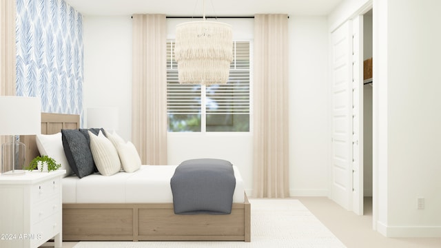 bedroom with an inviting chandelier