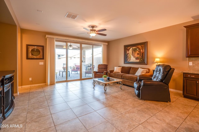 20742 E Mockingbird Dr, Queen Creek, AZ 85142 - living area featuring light tile patterned flooring, visible vents, and ceiling fan