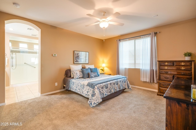 20742 E Mockingbird Dr, Queen Creek, AZ 85142 - carpeted bedroom featuring ceiling fan, arched walkways, visible vents, and baseboards