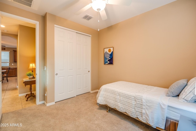 20742 E Mockingbird Dr, Queen Creek, AZ 85142 - bedroom featuring visible vents, arched walkways, a closet, baseboards, and light colored carpet