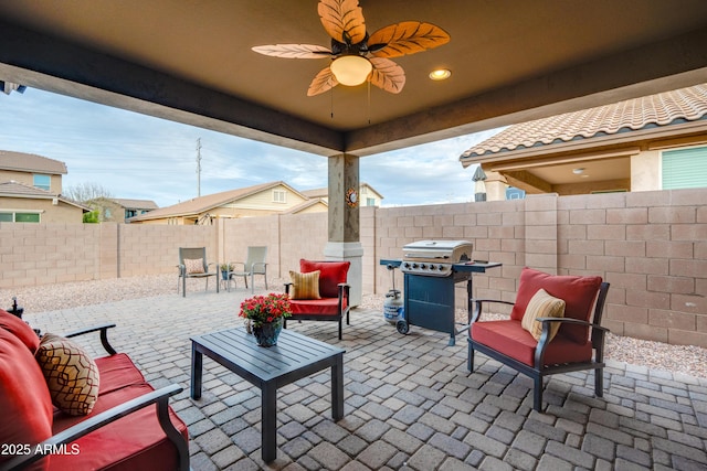 20742 E Mockingbird Dr, Queen Creek, AZ 85142 - view of patio / terrace featuring grilling area, an outdoor living space, a ceiling fan, and a fenced backyard