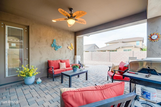 20742 E Mockingbird Dr, Queen Creek, AZ 85142 - view of patio / terrace with fence, a ceiling fan, and outdoor lounge area