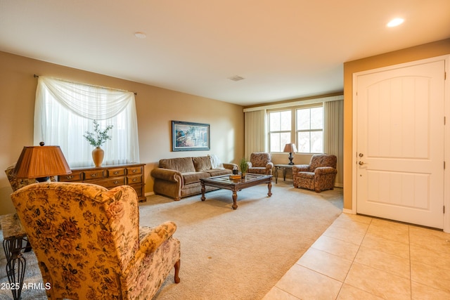 20742 E Mockingbird Dr, Queen Creek, AZ 85142 - living room with light carpet, recessed lighting, and light tile patterned flooring
