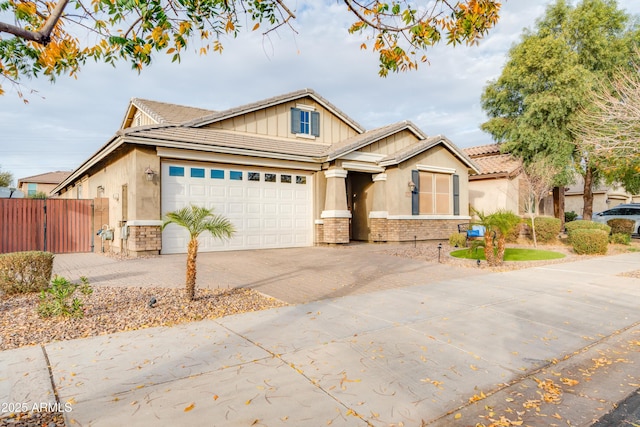20742 E Mockingbird Dr, Queen Creek, AZ 85142 - view of front of property with a tile roof, concrete driveway, an attached garage, fence, and stucco siding