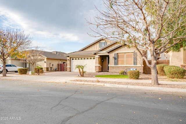 20742 E Mockingbird Dr, Queen Creek, AZ 85142 - view of front facade with concrete driveway, stucco siding, and a garage