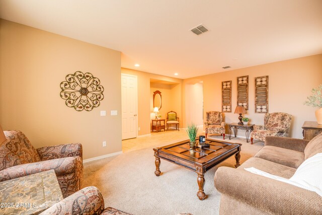 20742 E Mockingbird Dr, Queen Creek, AZ 85142 - living room featuring recessed lighting, visible vents, baseboards, and light carpet