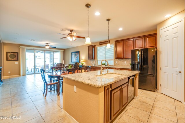 20742 E Mockingbird Dr, Queen Creek, AZ 85142 - kitchen with plenty of natural light, a ceiling fan, a sink, and black fridge