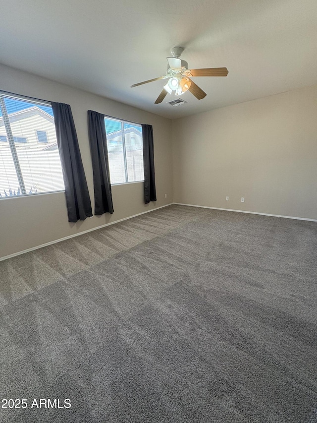 33512 N 24th Ln, Phoenix, AZ 85085 - carpeted empty room featuring ceiling fan and baseboards