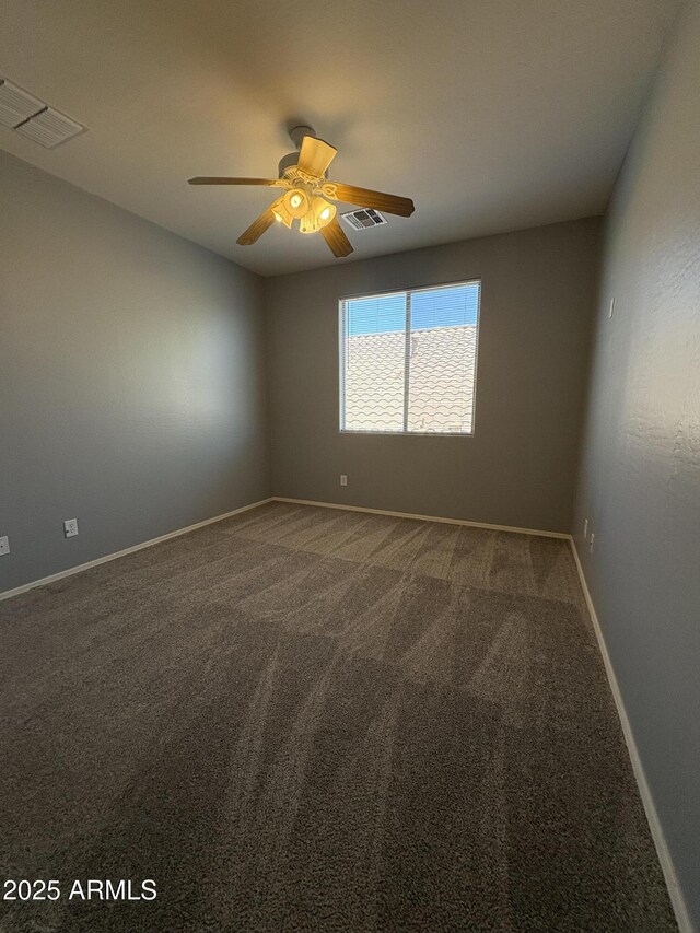 33512 N 24th Ln, Phoenix, AZ 85085 - empty room featuring a ceiling fan, carpet floors, and baseboards