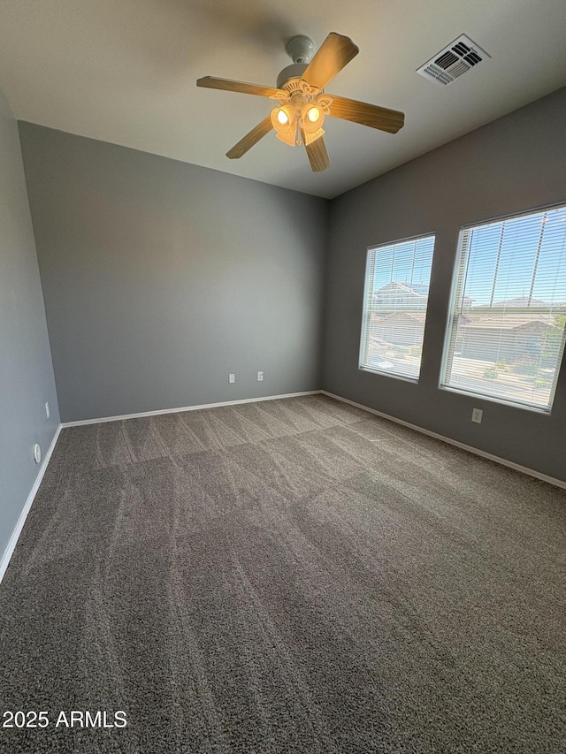 33512 N 24th Ln, Phoenix, AZ 85085 - carpeted empty room featuring baseboards and a ceiling fan